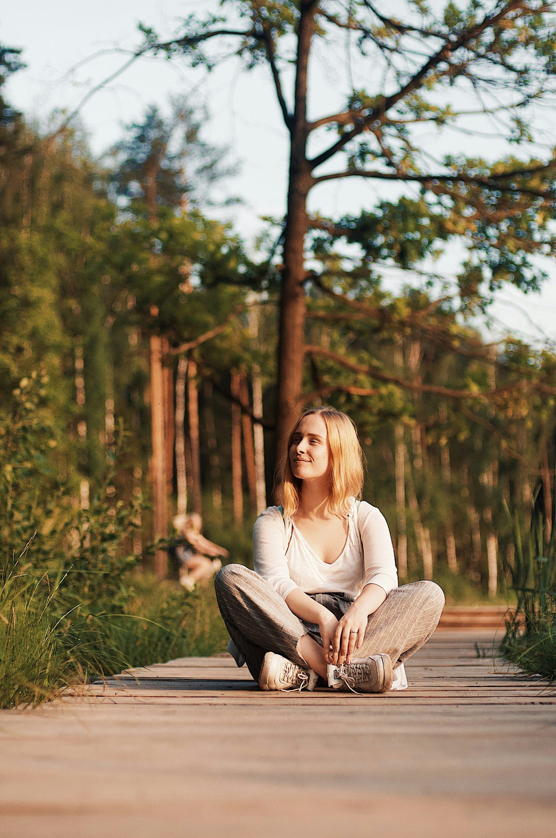 woman sitting on ground